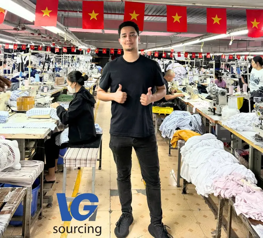Ouail Tibari, sourcing agent in China, on a garment factory floor